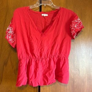 Red peplum shirt with beautiful floral detail